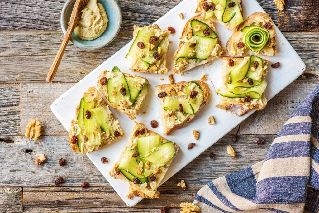 appetizers for a crowd-hummus-cucumber-toast-HelloFresh