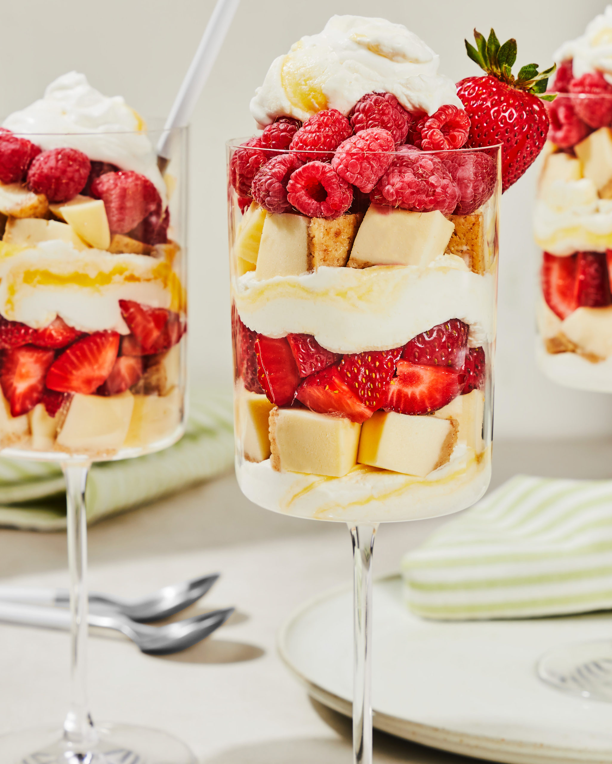 Mini cheesecake trifle with berries and cream